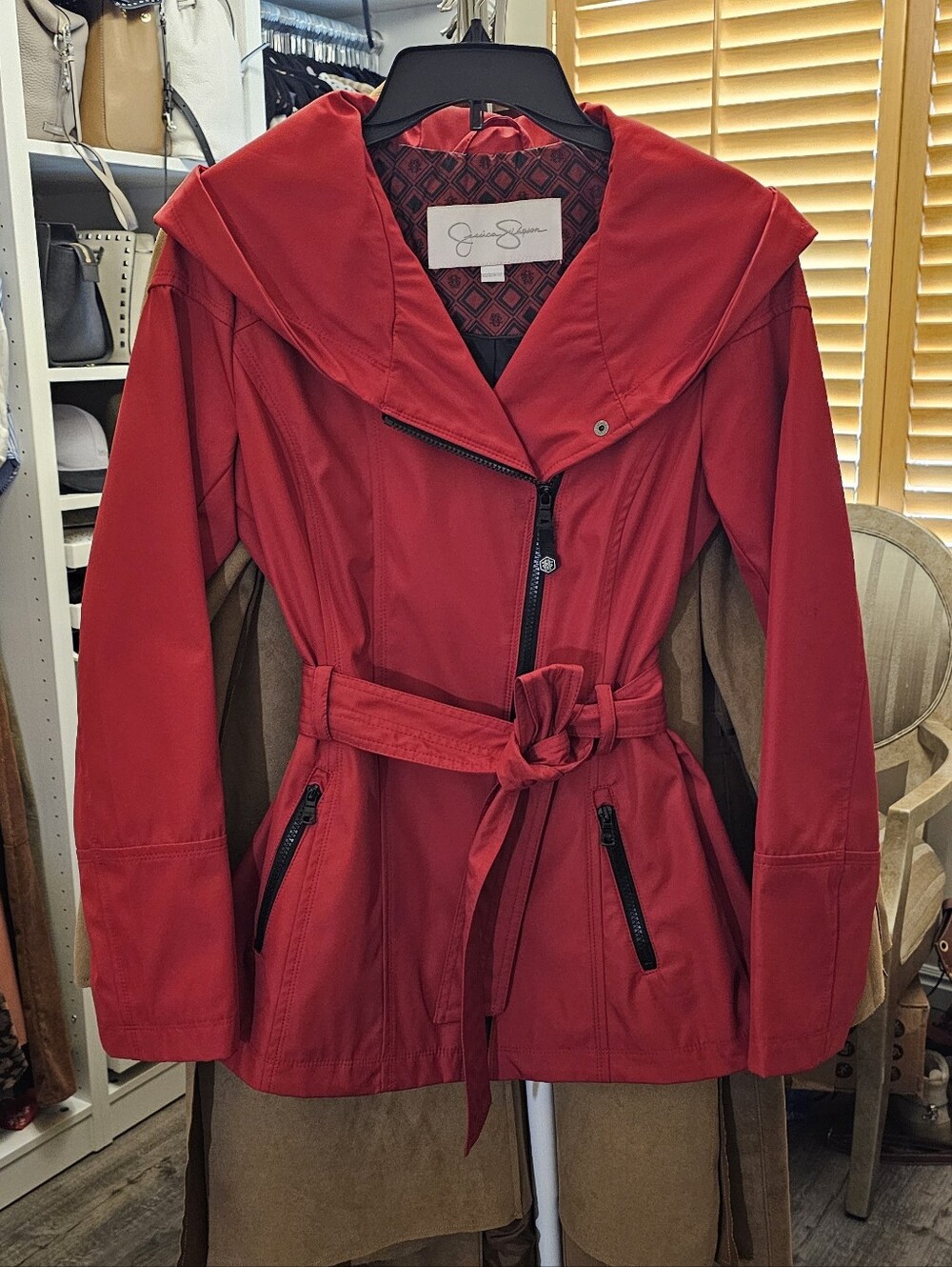 Jessica Simpson red rain jacket. Size XS.